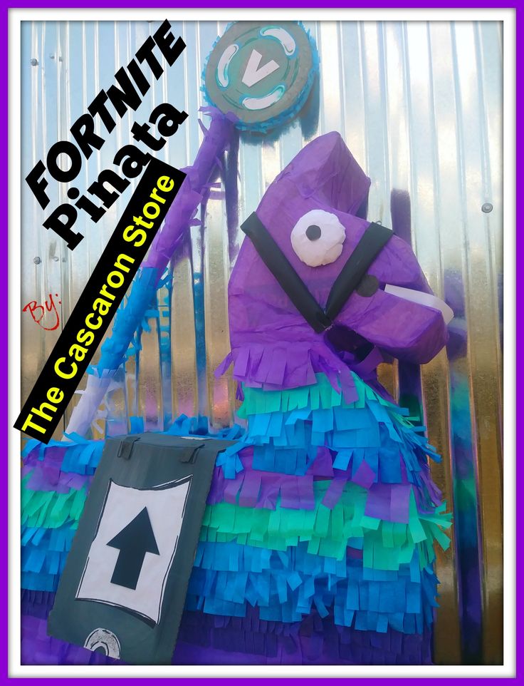 a purple stuffed animal sitting on top of a chair next to a sign that says, fortnite pirate