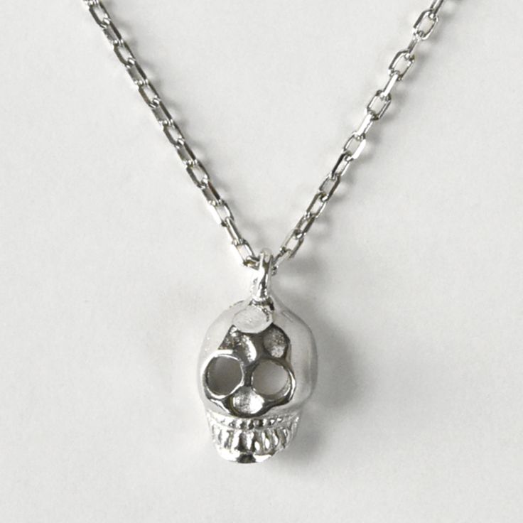 Memento Mori Necklace in Sterling Silver - Goldmakers Fine Jewelry Adjustable White Gold Pendant Charm Necklace, Symbolic Sterling Silver Necklace With Adjustable Chain, Adjustable Silver Hallmarked Necklaces, Sterling Silver Jewelry With Adjustable Chain And Round Pendant, Sterling Silver Necklace With Adjustable Chain, Sterling Silver Jewelry With Adjustable Round Pendant, Sterling Silver Symbolic Charm Necklaces For Gifts, Symbolic Sterling Silver Dangle Charm Necklaces, Nickel Free Sterling Silver Pendant Charm Necklace