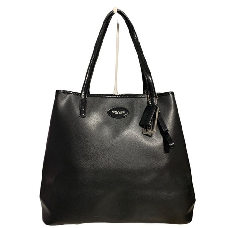 Coach Metro Leather Tote All Black Preloved In Great Condition With Normal Wear On The Exterior And Interior. Please See All Pictures. All Wear Can Be Seen In Pictures. This Is A Pre-Owned, Ready To Be Used. Coach Style # F31326 Inside Zip, Cell Phone And Multifunction Pockets Handles With 7 3/4" Drop 18 1/4" (L) X 12" (H) X 6" (W) Coach Bags With Detachable Handle For Office, Coach Tote Bag For Office, Coach Office Tote Bag, Coach Leather Bags With Large Capacity, Elegant Coach Satchel With Large Capacity, Coach Tote Shoulder Bag For Office, Coach Shoulder Bag For Office With Large Capacity, Coach Satchel For Shopping, Formal Coach Bags With Leather Handles