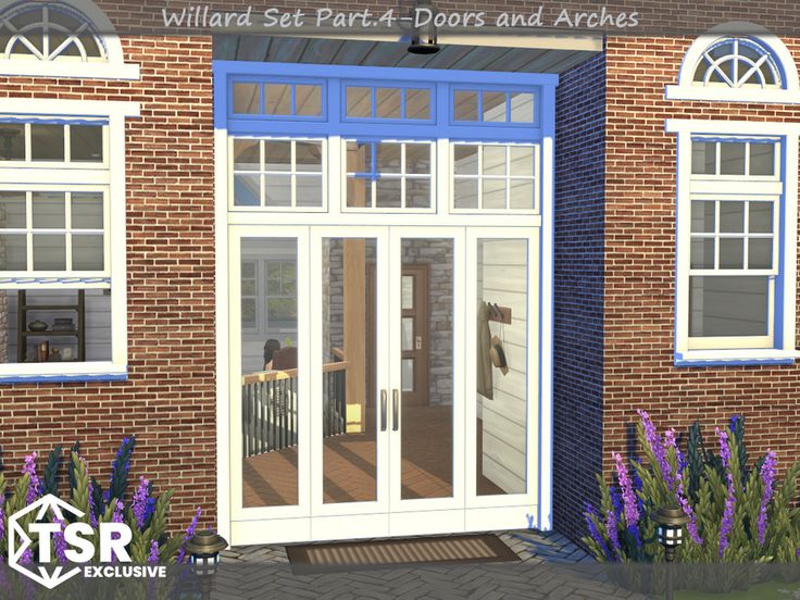 an image of a brick building with glass doors and windows on the front door, surrounded by purple flowers