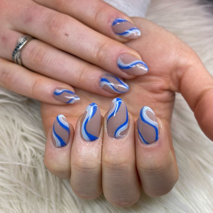 Almonds Shape Nails, Swirly Nail Designs Almond Shape, Almond Wave Nails, Aesthetic Swirl Nails, Blue Nail Swirl Designs, Swrill Design Nails Blue, Acrylic Nails Blue Swirls, Blue Nails Squiggle, Birthday Nails Almond Blue