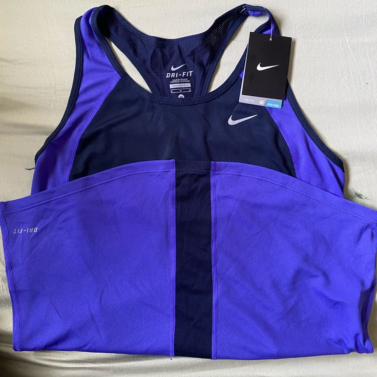 Light Weight Sporty Purple Running Tops, Sporty Purple Sleeveless Top, Sporty Sleeveless Purple Top, Purple Sleeveless Moisture-wicking Top, Purple Sleeveless Sportswear Top, Purple Sleeveless Sporty Top, Purple Moisture-wicking Tops For Running, Moisture-wicking Purple Tops For Running, Casual Purple Top For Running