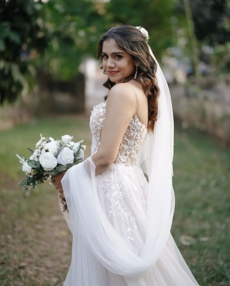 Modern Christian wedding gowns Wedding Saree South Indian Bride, Modern Christian Wedding, Indian Bride Saree, South Indian Bridal Look, Gown Hairstyle, Indian Bridal Look, Christian Wedding Gowns, Christian Bridal Saree, South Indian Wedding Saree