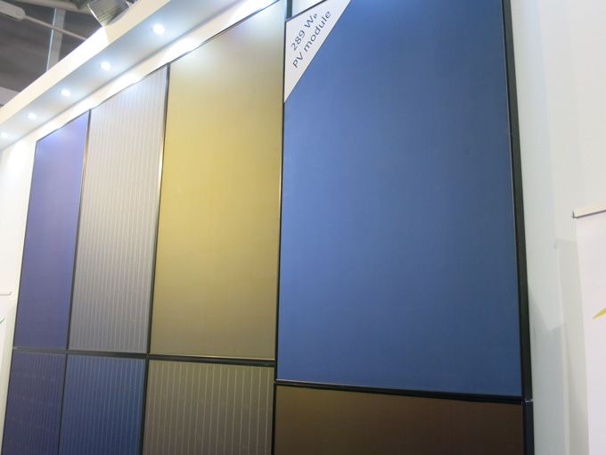 a wall that has some different colored panels on it