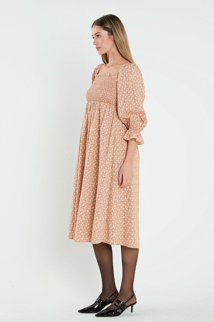 This English Factory dress is a wardrobe staple. With a stylish floral print on a figure-hugging silhouette, this midi dress is perfect for any outing. The smocked bodice is flattering and feminine, while the off-shoulder neckline makes it versatile enough to wear on any occasion. Smocked bodice The elastic neckline can be worn on or off-shoulder Midi length Floral print Hand wash cold Do not bleach Do not tumble dry Iron low Shell: 70% Cotton 27% Nylon 3% Spandex Lining: 100% Rayon Exclusive of Feminine Smocked Dress With Square Neck For Brunch, Feminine Square Neck Smocked Dress For Brunch, Square Neck Floral Midi Dress For Daywear, Fall Knee-length Dress With Smocked Bodice, Summer Midi Smocked Dress With Ditsy Floral Print, Feminine Floral Print Smocked Dress For Brunch, Feminine Smocked Dress With Floral Print For Brunch, Ditsy Floral Print Midi Dress For Day Out, Midi Dress With Ditsy Floral Print For Day Out