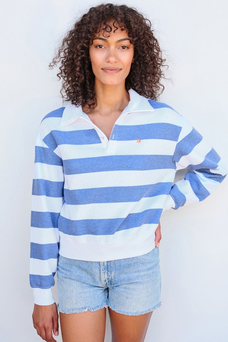 Our rugby style top is the cutest with its johnny collar, sail embroidery and nautical stripes. Sailor Style Striped Long Sleeve Top, Sailor Striped Long Sleeve Top, Striped Sailor Long Sleeve Top, Striped Cotton Varsity Tops, Cotton Sailor Top With Sailor Collar, Preppy Tops With Striped Polo Collar, Preppy Polo Collar Top With Striped Details, Preppy Top With Striped Polo Collar, White Polo Collar Top With Striped Cuffs