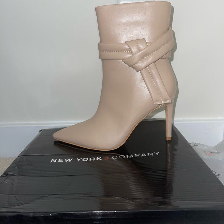 Size 7.5 Heeled Boots. Beige. Brand New, Never Worn. Spring High Heel Boots With Heel Strap, Spring Office Boots With 4-inch Heel, Chic Spring Boots With Heel Strap, Chic High Heel Boots With Heel Loop, Chic Beige Ankle Strap Boots, Chic Ankle Strap Beige Boots, Fitted Ankle-high Beige Heeled Boots, Cream Ankle-high Heeled Boots With Stacked Heel, Beige Ankle-high Boots With Stacked Heel