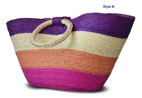 Striped beach handbag made of woven palm with twin handles and velcro strap. 17.75 in tall, 9.5 in length and 7.5 in width.Palm baskets and other woven palm products represent one of Mexico's oldest traditional crafts. All woven items are produced by hand by local basket crafters in the villages throughout Mexico where an abundance of palm groves are found.Some other colors also available. Multicolor Straw Beach Bag With Bamboo Handle, Multicolor Rectangular Jute Beach Bag, Multicolor Straw Bag With Bamboo Handle For Vacation, Rectangular Multicolor Straw Beach Bag, Multicolor Straw Tote Bag With Bamboo Handle, Rectangular Palm Leaf Beach Bag With Bamboo Handle, Multicolor Beach Bag With Handles, Multicolor Rectangular Straw Beach Bag, Multicolor Basket Shoulder Bag For Beach