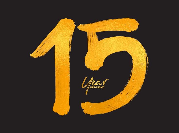 the number fifteen is written in gold paint on a black background with an inscription that reads,