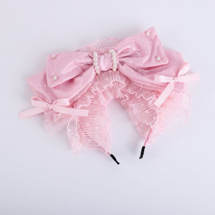 Indulge in the charm of Lolita fashion with our Sweet Pink Big Bow KC. This exquisite KC features a big bow in a delicate shade of pink, adorned with glistening beads that add a touch of elegance. The bowknot is complemented by intricate polka-dot lace ruffles, creating a playful yet sophisticated aesthetic. Designed to capture the essence of Lolita style, this KC is ideal for adding a sweet and whimsical touch to any outfit. Cute Ribbon Bow For Party, Cute Party Bow With Ribbon, Cute Ribbon Bow For Parties, Cute Pink Hair Accessories For Party, Cute Pink Party Hair Accessories, Pink Bow For Spring Party, Cute Pink Hair Accessories For Wedding, Pink Bow Gift For Spring, Spring Party Hair Accessories With Decorative Bow