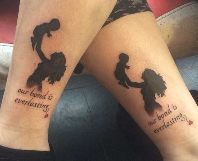 two people with tattoos on their legs that say, our bond is everlasting