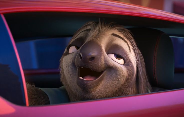 an animated character is smiling in the driver's seat of a car