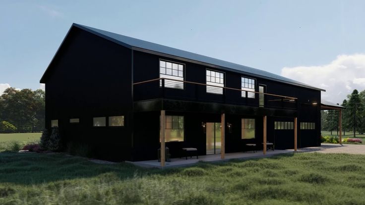 an artist's rendering of a large black barn style house in the middle of a field