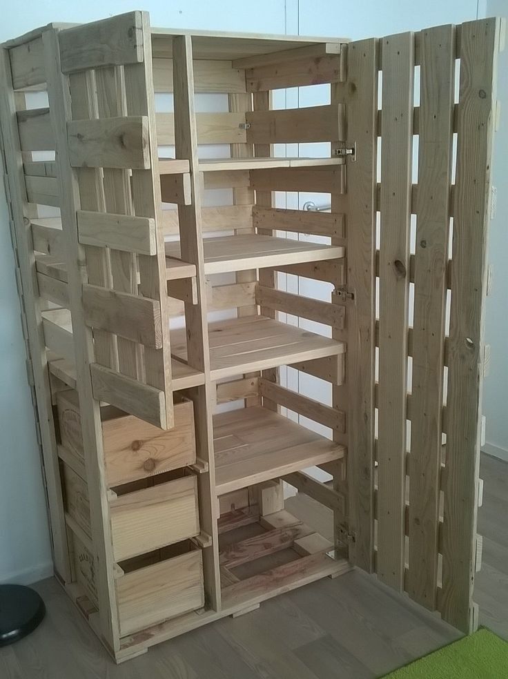 a room with some shelves made out of wooden pallets