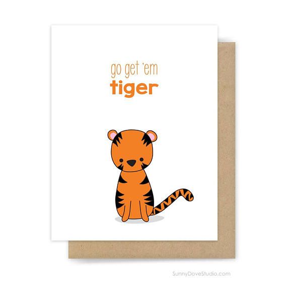 a card with an orange tiger sitting on top of it's back and the words go get em tiger