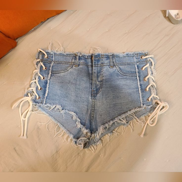 Forever 21 Lace Up Jean Shorts. Super Short. Size M But Can Be Adjusted To Bigger Size With Laces On The Sides. Bold Statement Piece. Stand Out At The Beach! Only Tried On But Never Worn Forever 21 Blue High-waisted Shorts, Forever 21 Summer Bottoms With Built-in Shorts, Forever 21 Bottoms With Built-in Shorts For Summer, Forever 21 Summer Cutoff Shorts, Forever 21 Blue Shorts For Spring, Forever 21 Blue Summer Bottoms, Blue Summer Bottoms From Forever 21, Forever 21 High Waist Bottoms For Vacation, Forever 21 Bottoms With Built-in Shorts For Vacation