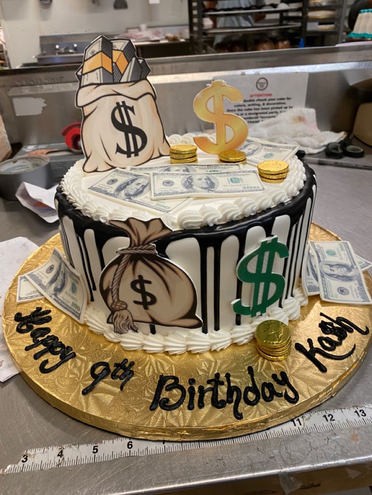 a birthday cake decorated with money and coins