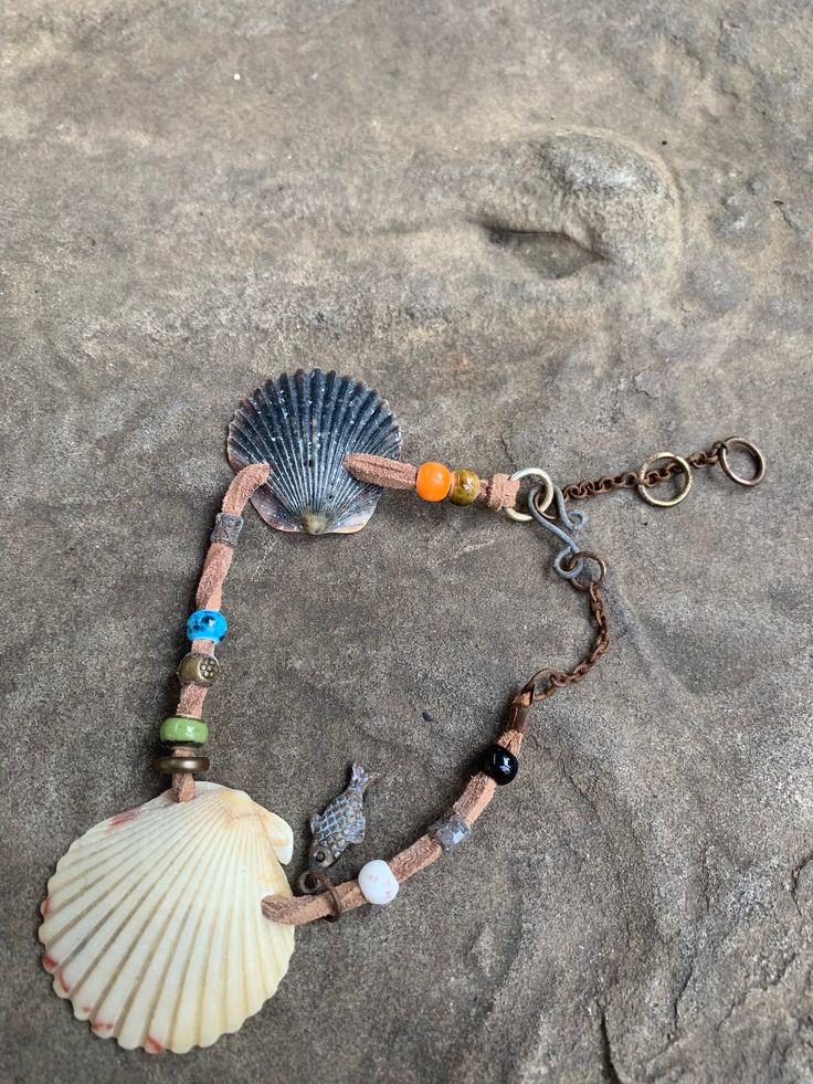 Scallop shells. 9"-11" square leather double strand ankle bracelet. Ceramic and bronze beads. Hand crafted hook closure. Scallop Shell, Scallop Shells, Shell Bracelet, Ankle Bracelet, Anklet Jewelry, Ankle Bracelets, Body Jewelry, Anklets, Hand Crafted