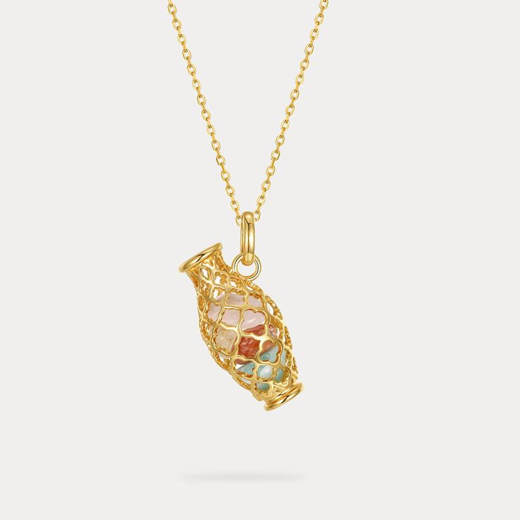 A World of Wonder with our Gold Hollow Amphora Necklace, reminiscent of ancient artistry. Inspired by historic vessels, this pendant features a delicate 10k gold-plated silver amphora shape filled with a sparkling gemstone. Rich, saturated hues and classic cuts evoke a sense of retro glamour, perfect for the vintage fashion enthusiast, this gemstone necklace is a treasure waiting to be rediscovered. Whether a mother's day gift for a history buff or a treasure for yourself, this piece embodies the beauty of the world itself. DETAILS Plating: 10K Gold  Materials: 10K Gold on Silver, Gemstone Measurements: Length: 15.75 "(40cm)   + Extender: 1.97"(5cm) Pendant Size: 0.47"*0.98"(1.2cm*2.5cm) Weight: 4.5 g Unique Yellow Gold Necklace For Ceremonial Use, Engraved Yellow Gold Necklaces For Celebration, Unique Gold Necklaces For Ceremonial Occasions, Gold Plated Pendant Necklace For Celebration, Yellow Gold Engraved Necklaces For Celebration, Yellow Gold Pendant Necklace For Celebration, Celebration Gold Plated Pendant Necklace, Engraved Yellow Gold Necklace For Celebration, Amulet Pendant Necklaces For Celebration