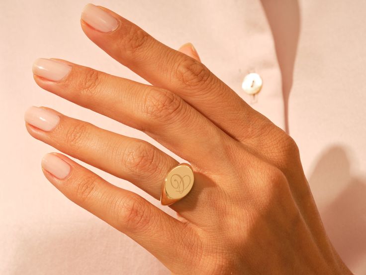 Solid gold Oval Signet Ring from your choice of yellow gold, white gold or rose gold, with 4 different size options. Customize this signet ring with your name, initials, or monogram. This classic signet ring is perfect for everyday wear and can be used as a family crest, coat of arms ring, graduation ring, personalized gift, or any other deserved reward. FeaturesGold Kt Options: 14k (18k is also available with 1-2 days of more production time)Color Options: Yellow Gold, Rose Gold and White GoldA Personalized Rose Gold Signet Ring For Everyday, Luxury Oval Signet Ring For Everyday, Modern Oval Rose Gold Signet Ring, Modern Rose Gold Oval Signet Ring, Oval Yellow Gold Signet Ring With Initials, Modern Oval Initial Ring For Wedding, Timeless Oval Initial Ring, Everyday Oval Initial Ring Stamped 14k, Rose Gold Oval Initial Ring For Anniversary