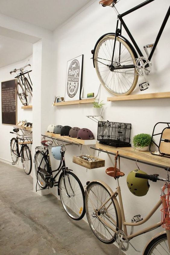 there are many bikes on the shelves in this shop