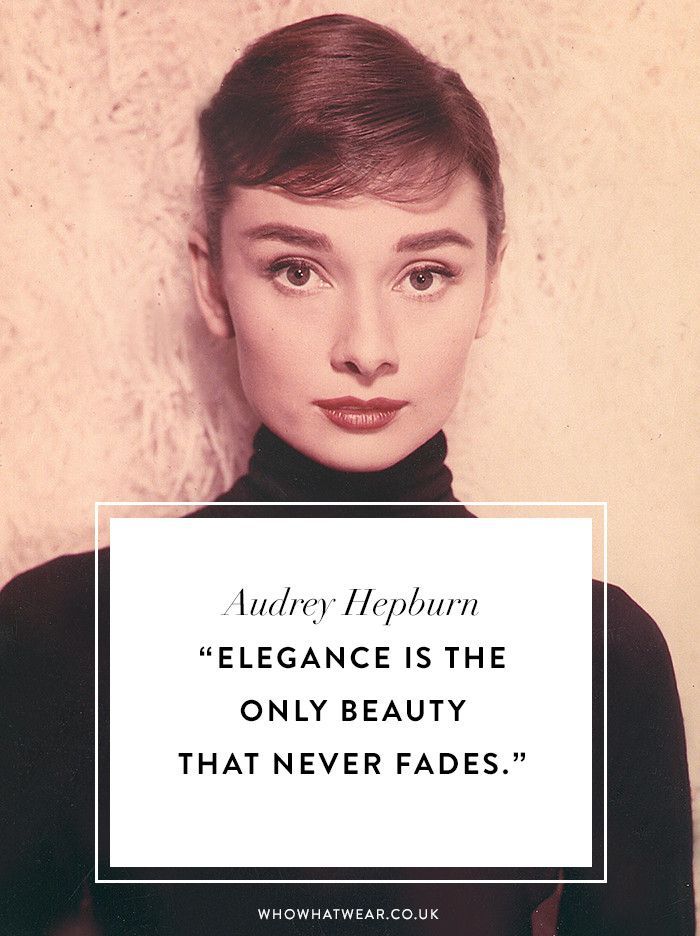 a woman holding up a sign that says, audrey happorn elegance is the only beauty that never fadess