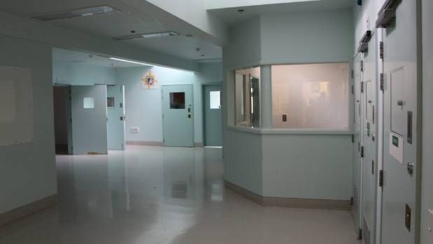 an empty room with several lockers in it