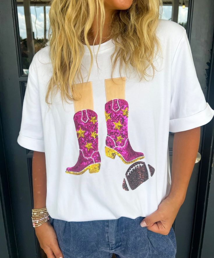 Get ready to sparkle with The Vaughnn Top! This crew neck tee features a sequined boot design that will add a touch of glamour to any outfit. Step up your style game with this playful and unique top. Lilli is wearing a size Small. Height is 5’3, Bust is 32”, Waist 26”, and Hips 33”. Casual Fall T-shirt With Sequins, Casual Sequined T-shirt For Fall, Boot Design, Unique Top, Vintage Havana, Top Graphic Tees, Sweater Set, Designer Boots, Mens Outerwear