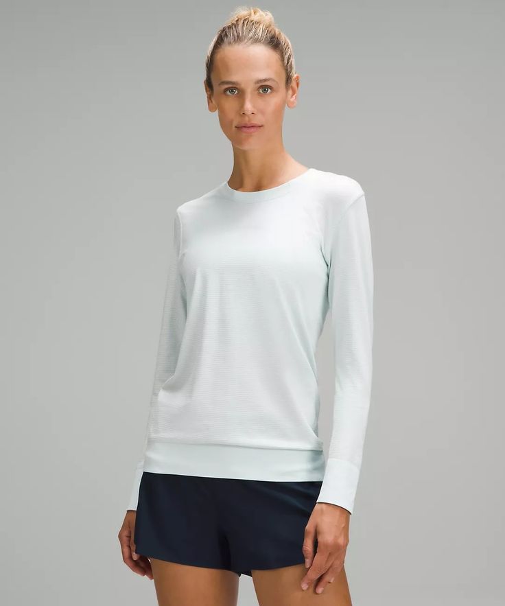 Swiftly Relaxed Long-Sleeve Shirt | Women's Long Sleeve Shirts | lululemon Lululemon Athleisure Tops With Moisture-wicking, Lululemon Stretch Tops For Layering, Stretch Lululemon Tops For Layering, Lululemon Stretch Tops For Gym, Lululemon Crew Neck Tops For Layering, Functional Long Sleeve Tops For Loungewear, Lululemon Stretch Activewear With Crew Neck, Casual Lululemon Activewear With Crew Neck, Versatile Everyday Lululemon Tops