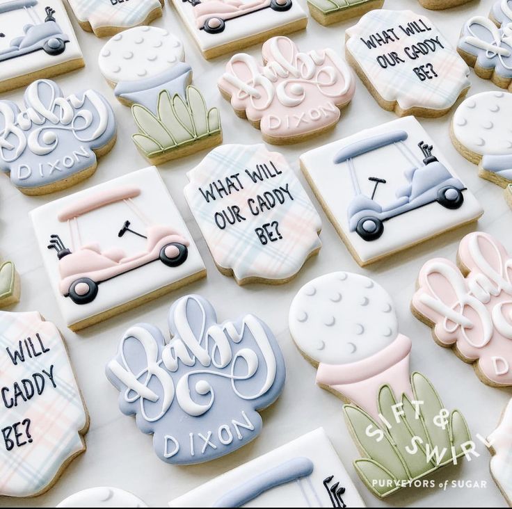 baby shower cookies are arranged on a table with the words what will your daddy be?