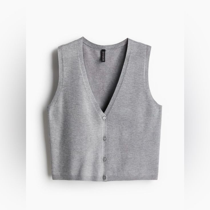 Sweater Vest In A Soft And Fine Knit. V Neck, Buttons At Front, With Ribbing At The Hem. Casual Fitted Sweater Vest With Buttons, Casual Sweater Vest With Buttons, H&m Winter Tops, Casual Sweater Vest With Button Closure For Layering, H&m Casual Tops For Layering, Casual H&m Tops For Layering, Trendy H&m Tops With Buttons, Casual Knit Sweater Vest With Button Closure, Casual H&m V-neck Cardigan