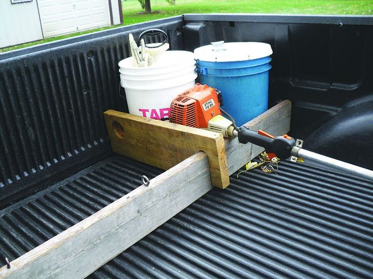 the back end of a truck with tools in it