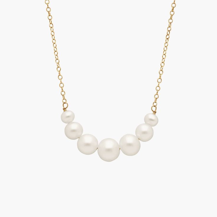 Add some freshness to your pearls with this graduated smile necklace of freshwater cultured pearls. Ranging from 3.5mm pearls to 6.5mm, this is the perfect gift for a bridesmaid or on your wedding day. Refined Akoya Pearl Necklace With Pearl Chain, Refined Akoya Pearl Necklace, Refined Pearl Necklace With Pearl Chain, Refined Pearl Chain Necklace, Refined Pearl Necklace, Refined Anniversary Pearl Necklace With Pearl Chain, Refined Pearl Chain Necklace For Anniversary, Refined Pearl Necklace With Pearl Drop, Refined Pearl White Necklace With Pearl Chain