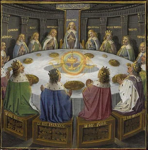 a painting of people sitting around a table with the king and queen at their feet