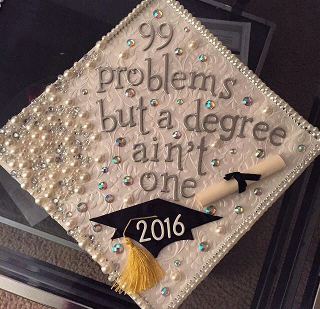 a decorated graduation cap with the words 99 problems but a degree is one on it