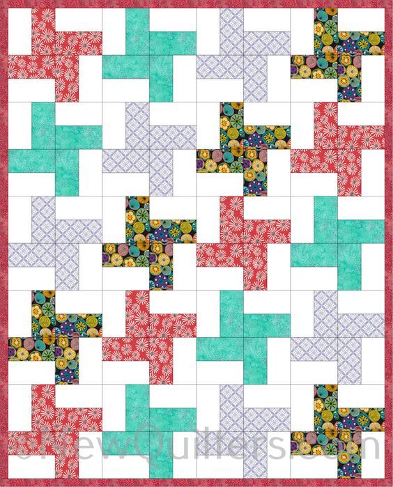 a quilted square with different colored squares on the side and one block in the middle