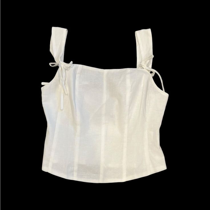 Nwt Rihoas Cotton Linen Blend Sleeveless Crop Top Size Small New With Tags Fabric Tie Adjustable Straps Hidden Zippered Back Pit To Pit: 33” Shoulder To Bottom Hem: 17” Measurements Are Approximate And Taken While Laying Flat Photos Are Part Of The Description From A Pet & Smoke Free Environment Location - C15 Shop With Confidence *Posh Ambassador *Top Rated Seller *Fast Shipping *Packaging With Care * Bundle Other Items To Maximize Your Shopping Dollars Vacation Sleeveless Camisole, Fitted Sleeveless Camisole For Vacation, Elegant Cami Tops With Tie Straps, Elegant Sleeveless Crop Top For Beach, Fitted Summer Camisole With Tie Straps, Elegant Sleeveless Tops With Straps, Sleeveless Strapped Crop Top For Vacation, Sleeveless Crop Top With Straps For Vacation, Fitted Tank Vest For Vacation