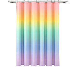 a rainbow colored shower curtain hanging on a metal rod