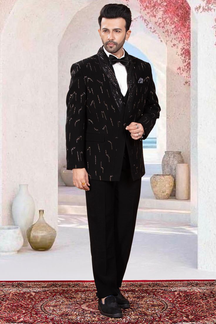 This Sherwani is expertly crafted with cutdana embroidery, adding a touch of vibrant elegance to a classic black design. Made for any special occasion, this piece will elevate your formal wear with its intricate details. Perfect for those looking for a sophisticated and unique look. Black Festive Party Wear Traditional Outfit, Black Festive Party Wear Traditional Dress, Festive Black Party Wear Traditional Outfit, Black Festive Traditional Party Wear, Designer Fitted Black Sets, Formal Black Set With Dabka Detailing, Formal Black Sets With Dabka Detailing, Black Sets For Evening Eid Celebration, Black Evening Sets For Eid