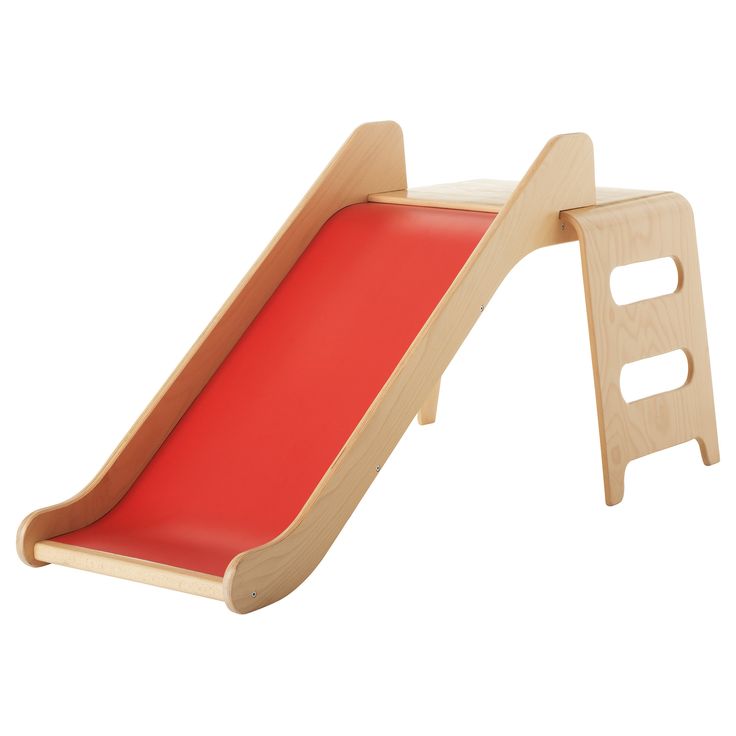 a wooden slide that is red and white