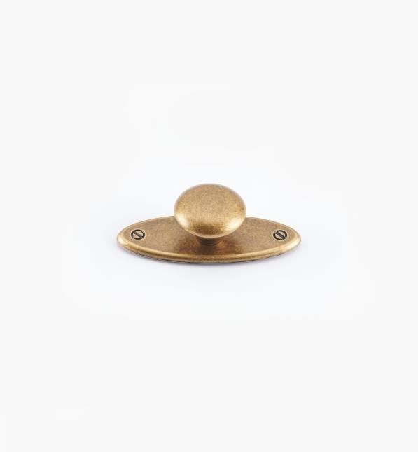 a brass plated metal object on a white background