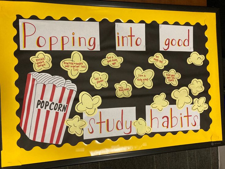 a bulletin board with popcorn and words on it that say popping into good study habitts