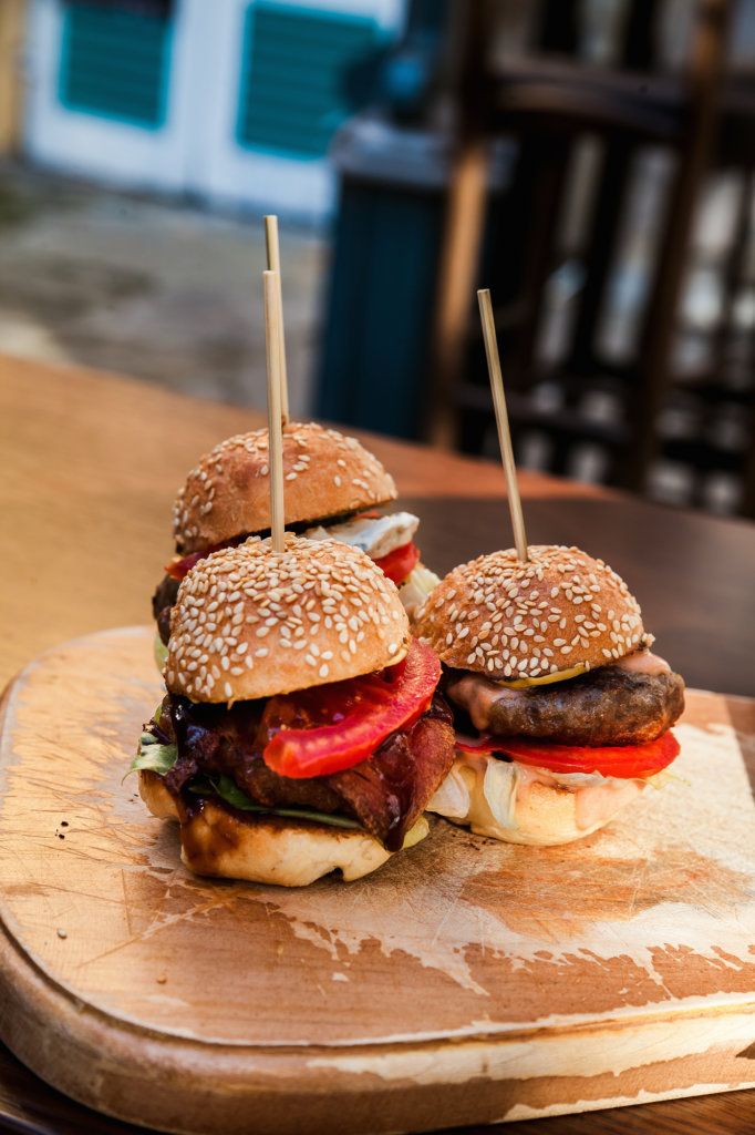 the best burgers in sedona are made with cheese, lettuce and tomatoes