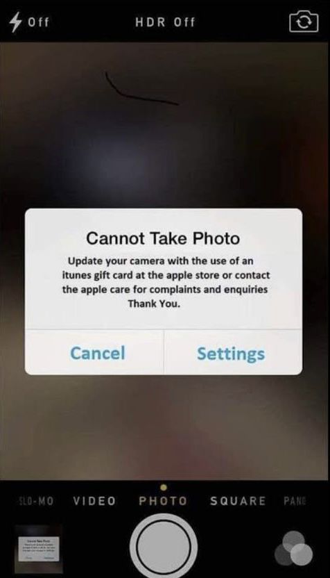 an iphone screen with the text cannot take photo and then click on it to change the camera settings