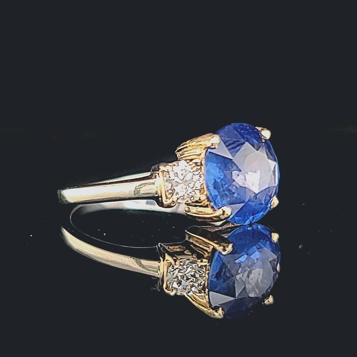 VINTAGE 14k white & gold DIAMOND AND SAPPHIRE  engagement RING CENTER NATURAL BLUE SAPPHIRE IN ROUND  CUT WEIGHT 3.65CT SIZE 9.8mm GORGEOUS BLUE SAPPHIRE medium blue color CLEAN ,VERY NICE CUT ,AMAZING BRILLIANCE FULL OF FIRE, side natural old mine cut natural diamonds 0.40ct. Si1 quality G- COLOR RING size 6.5 Retail value $8,500 net . Appraisal available Luxury Royal Blue Sapphire Round Ring, Timeless Blue Sapphire Ring Gia Certified, Timeless Gia Certified Blue Sapphire Ring, Heirloom Blue Sapphire Diamond Ring, Classic Yellow Gold Gia Certified Sapphire Ring, Classic 14k Gold Gia Certified Sapphire Ring, Classic Round Sapphire Diamond Ring, Classic Gia Certified Yellow Gold Sapphire Ring, Classic Sapphire Tanzanite Solitaire Ring