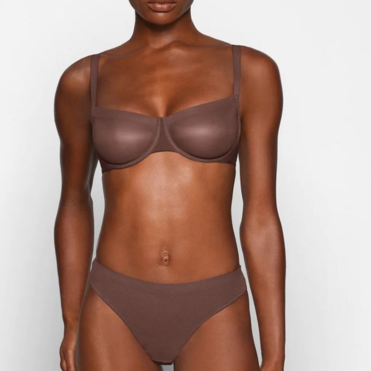 Color: Cocoa Details Flatter Your Curves In This Sheer, Sexy Balconette Designed With Comfortable, Next-Level Mesh. This Minimal Coverage Style Has A Seamless Raw Edge Finish, Making It Invisible Under Clothing, Plus Soft, Flexible Underwire For All The Support You Need Features Sheer Molded Unlined Cups, Smoothing Microfiber Wings, Skims Logo On Front Wing, And Hook And Eye Back Closure. Fits True To Size. Sheer Full Coverage Fitted Bra, Sheer Fitted Underwire Bra, Fitted Sheer Underwire Bra, Fitted Full Coverage Bra With Lined Body, Fitted Seamless Brown Bra, Sheer Fitted Push-up Bra, Fitted Full Coverage Brown Bra, Fitted Brown Full Coverage Bra, Sheer Push-up Bra