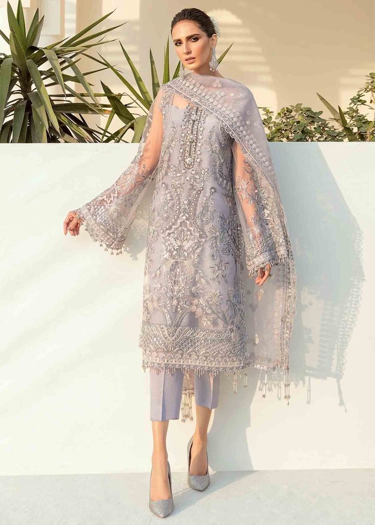 Includes: Embroidered net front Plain net back Embroidered net sleeves Embroidered sleeves patch Embroidered net front patches (02) Embroidered back patch Embroidered net dupatta Dyed silk trouser Fabric: Net Work Technique: Embroidered It is an unstitched three-piece outfit. Disclaimer: The color for the outfit may vary due to photographic lighting sources. Pakistani Party Wear, Pakistani Fancy Dresses, Salwar Kamiz, Pakistani Salwar Kameez, Pakistani Outfits, How To Dye Fabric, Pakistani Fashion, Pakistani Dresses, Chiffon Fabric