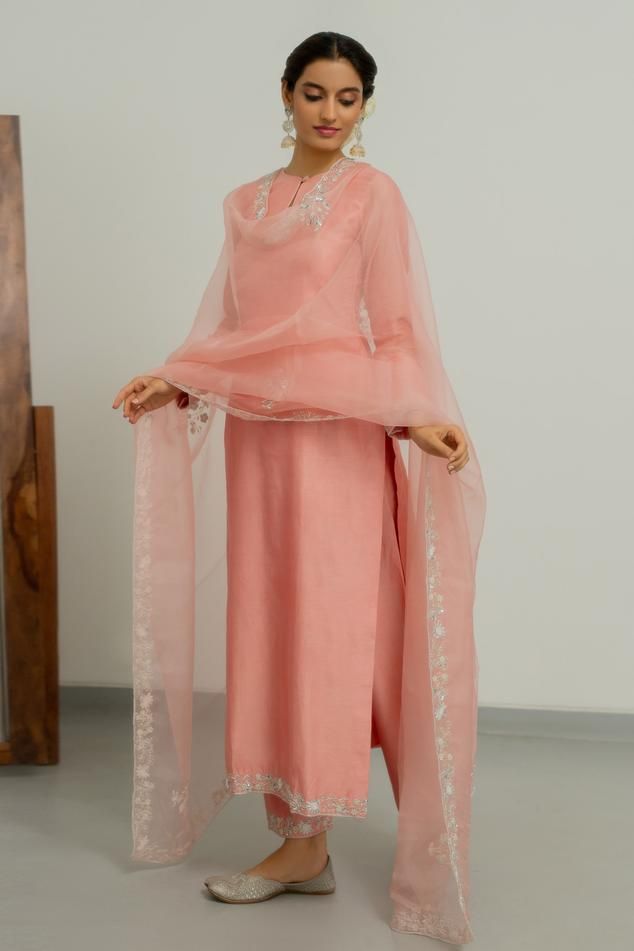 Blush pink chanderi silk kurta with zardosi hand embroidered cuffs and hemline. Comes with pant and a silk organza dupatta.
Components: 3
Pattern: Hand embroidered
Type Of Work: Zardosi
Neckline: Round
Sleeve Type: Full
Fabric: Chanderi silk, Dupatta : Silk organza
Color: Pink
Other Details: 
Closure : Kurta - Front button
Disclaimer : The product will dispose off some color, since it is hand dyed.
Occasion: Sangeet - Aza Fashions Wedding Outfits Indian, Flared Anarkali, Salmon Peach, Ethereal Elegance, Kurta Pant Set, Silk Kurta, Stylish Blouse Design, Boutique Dress Designs, Indian Aesthetic