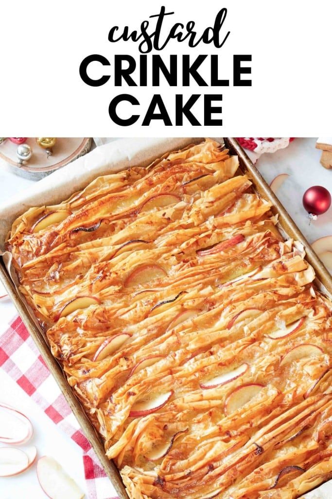 an image of a baked crinkle cake in a pan on a checkered table cloth