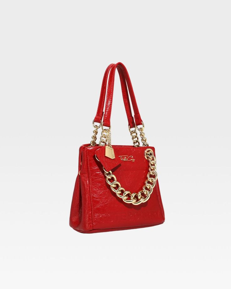 Elevate your style with our Luxurious Red Mini Tote Bag, crafted to add a touch of elegance and sophistication to your everyday ensemble reflecting a chic, modern aesthetic that captures attention wherever you go. Designed for the fashion-forward individual, it offers a perfect blend of style and functionality. Elegant Red Tote Shoulder Bag, Rolling Duffle Bag, Red Handheld Bags With Gold-tone Hardware, Nylon Travel Bag, Red Shoulder Bag With Gold-tone Hardware For Shopping, Modern Red Shoulder Bag With Gold-tone Hardware, Red Tote Bag With Gold-tone Hardware, Suitcase Set, Duffle Bag Travel